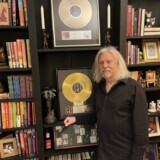 Steve McRay with gold platinum albums